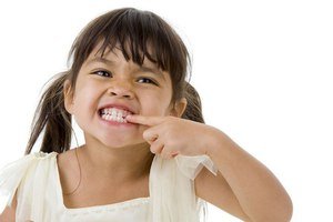Причины скрежета зубами у детей