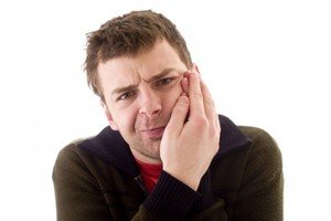 Симптомы кисты на дёснах зубов